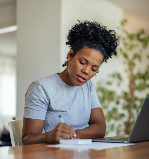 Black woman taking CE courses.